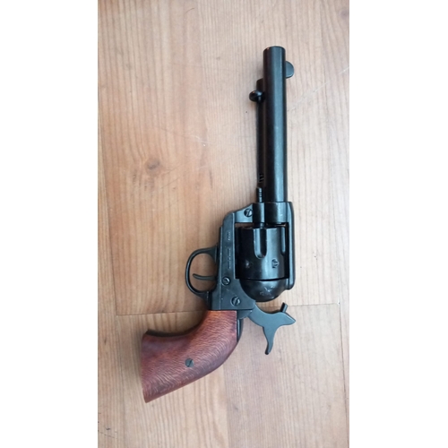 46H - American .45 cal peace  maker 1873 model replica as new     metal with wooden grips