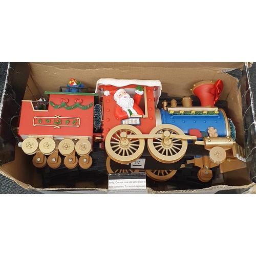 319 - Boxed Christmas train with tracks battery operated