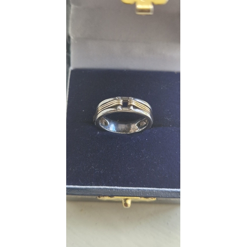 004 - 9ct gold and silver ring,  tested size k