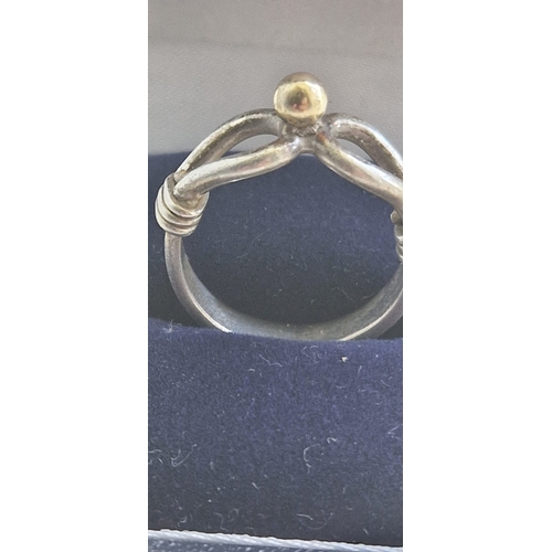 16Q - 9ct gold and silver ring,  tested. Size k