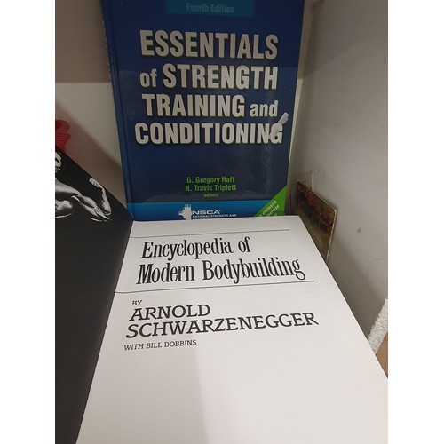 1187 - 2 large strength Training And Body Building Books