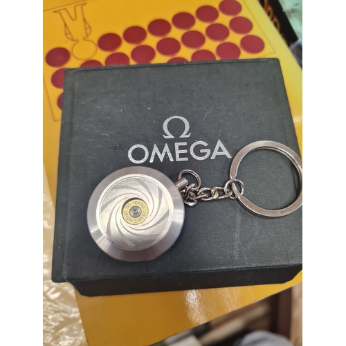 4U - GENUINE OMEGA JAMES BOND 007 KEYRING HOLDER 50 YEARS LIMITED WATCH