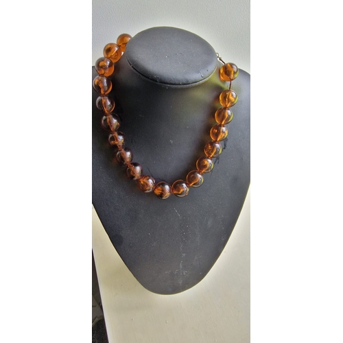 4R - Amber stringed beads tested