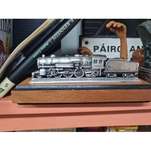 0016 - Vintage model metal train on plinth