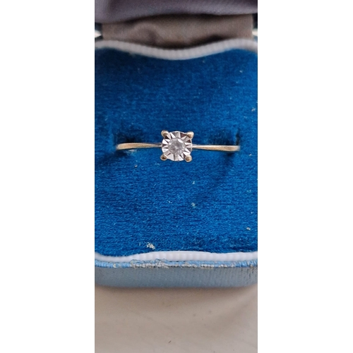 94 - 9ct gold diamond solitaire ring. Size P1/2
1.3g