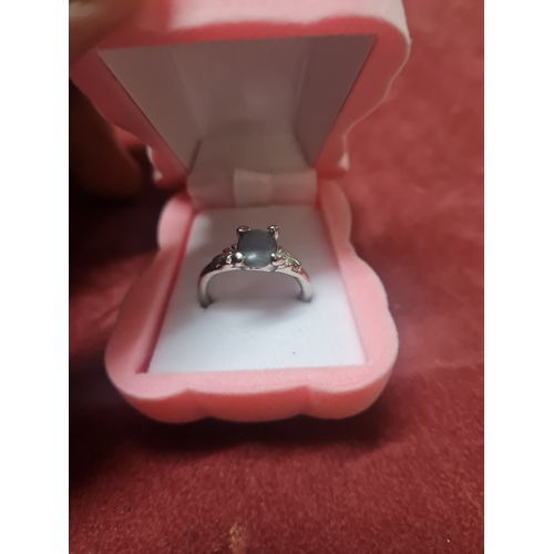 460 - Ladies ring in box

Need clip repaired