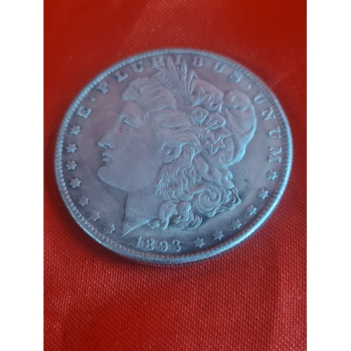 557 - Us morgan dollar 

Sticks to magnet so down as replica