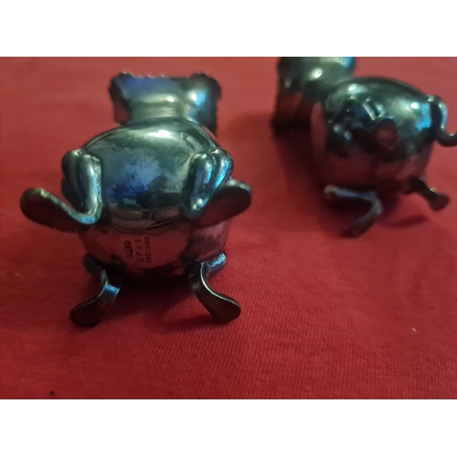 135 - Vintage stamped salt and pepper set