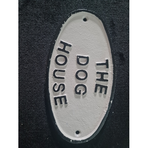 301 - The dog house iron sign