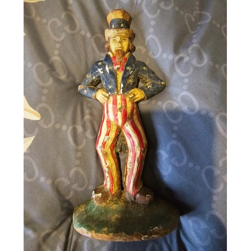 4A - Vintage cast iron uncle sam door stop