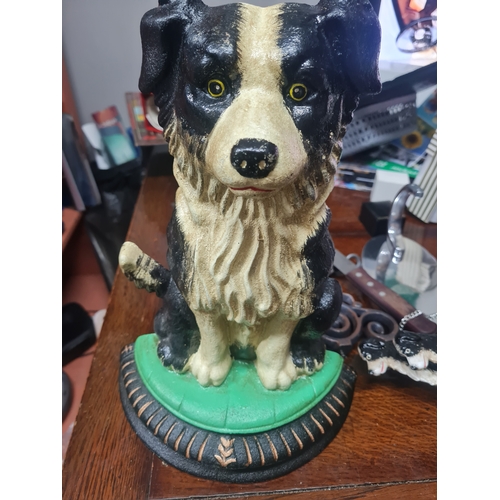 343 - Large cast iron collie door stopper