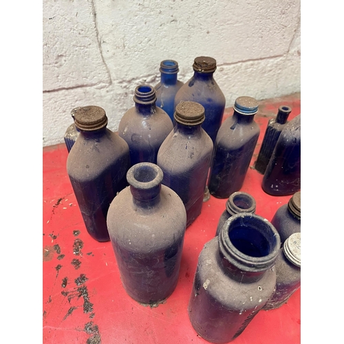 24A - Collection of Vintage blue bottles.