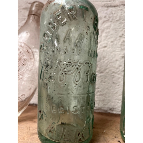 30 - May Roberts, Robert Barr Falkirk, Lawrence Yarmouth, H.W Carter & Co bottles