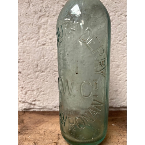 33 - Vinatge bottle. M.W Co Ballyronan The South Derry.