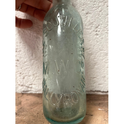 33 - Vinatge bottle. M.W Co Ballyronan The South Derry.