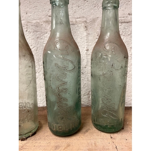 34 - O’Briens & Co Dublin, Draper Dublin Vintage bottles.