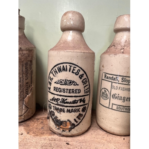 38 - Five Antique earthenware bottles.