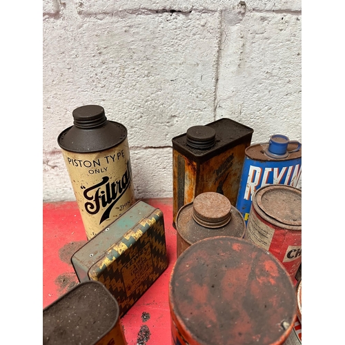 45 - Vintage oil and lubricant tins and cans