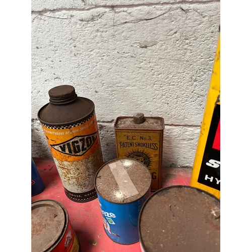 45 - Vintage oil and lubricant tins and cans