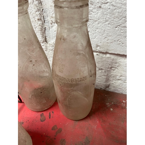 71 - Milk bottle holder with 12 bottles, Irish.