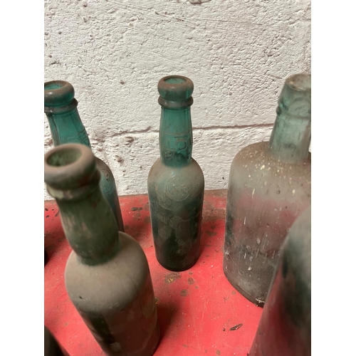 73 - Antique bottles inc. T. Wood & Son, Gordons Gin