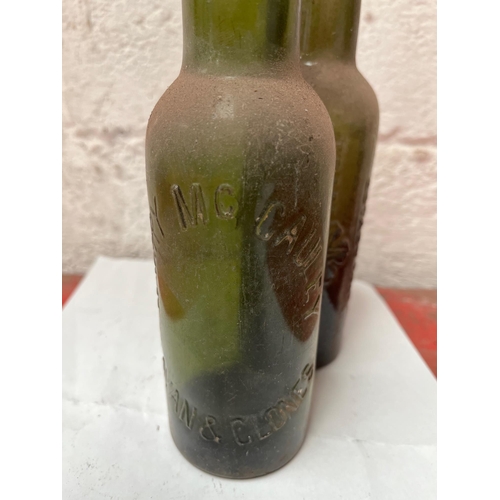 75 - 2 Antique Bottles, Kierker &Co, H. McCauley