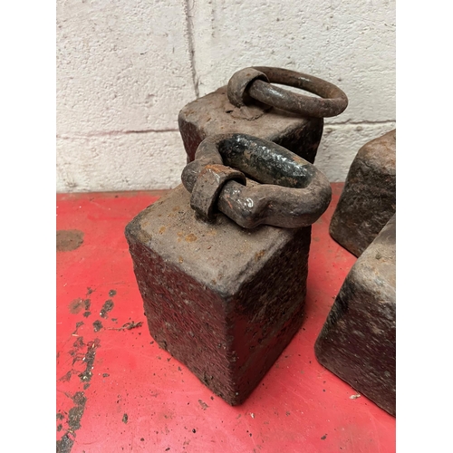 84 - Four Antique weights.