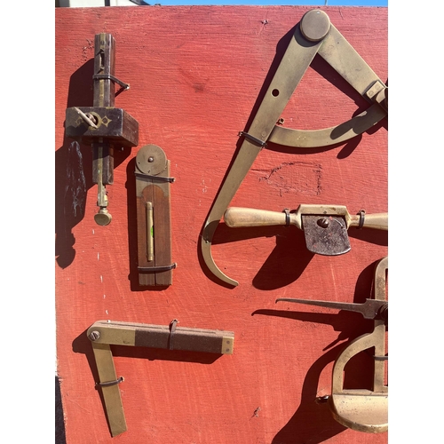 56 - Brass measuring implements