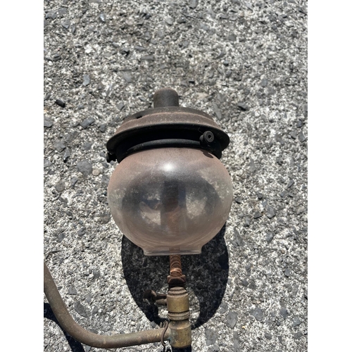 62A - Wall-mounted brass Tilley lamp.