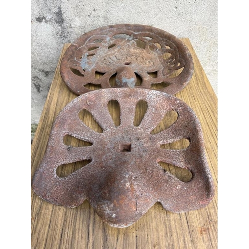 420 - Pierce cast iron seat and another. {43 cm W x 39 cm H}