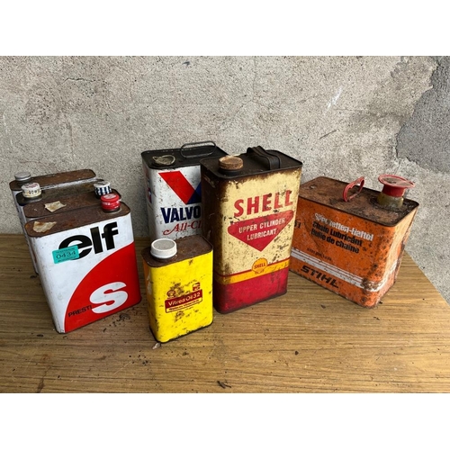 434 - Collection of vintage oil and petrol cans.