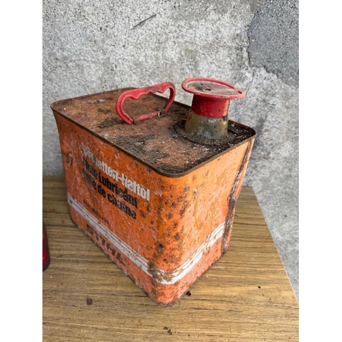 434 - Collection of vintage oil and petrol cans.