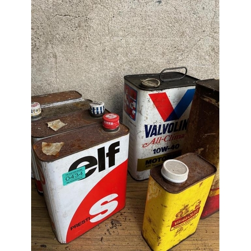 434 - Collection of vintage oil and petrol cans.