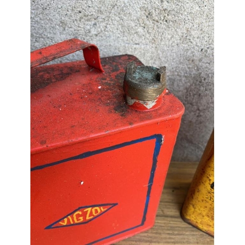 440 - Vigzol oil can and another vintage oil can. {25 cm W x 30 cm H x 15 cm D}