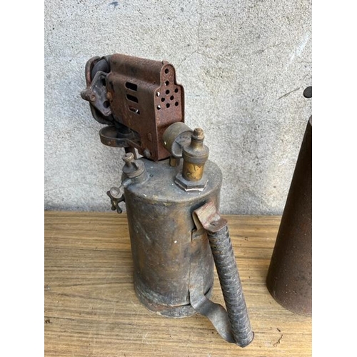 446 - Three vintage brass and metal blow lamps.