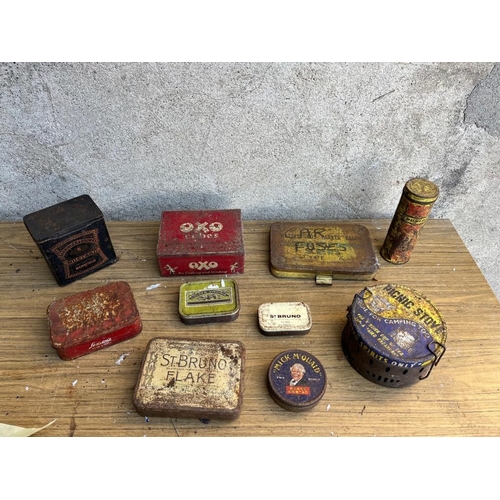 450 - Collection of vintage tobacco tins and other tins.