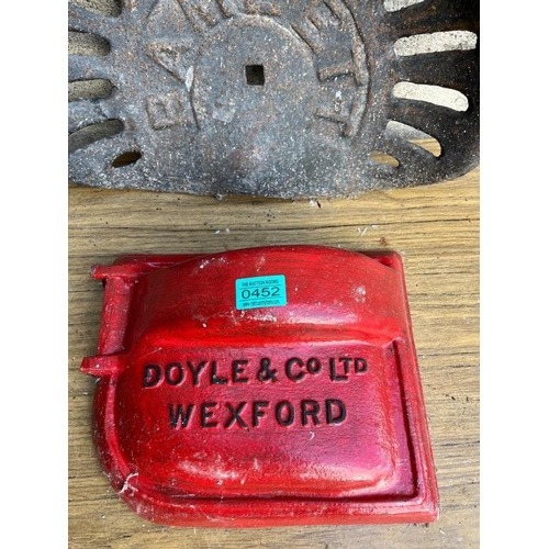 452 - Bamlet cast iron seat, Doyle & Co Wexford cover. {40 cm W x 32 cm H}