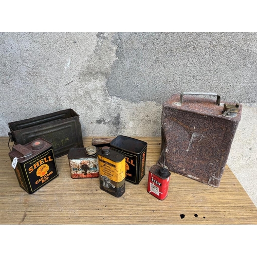 485 - Shell petrol can as found & other vintage oil cans