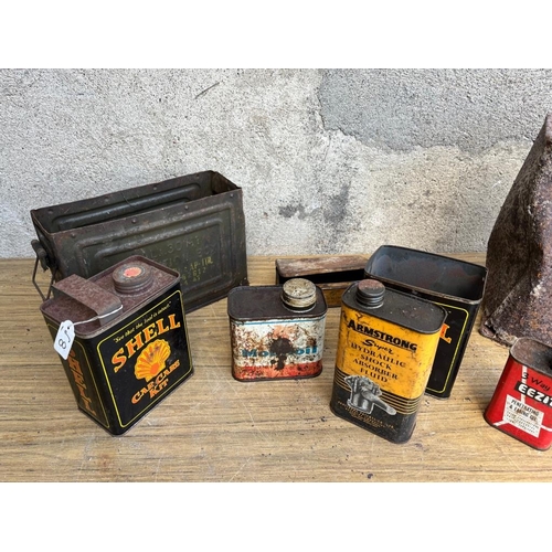 485 - Shell petrol can as found & other vintage oil cans