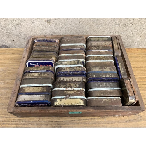 14 - Large collection of tobacco boxes complete with drawer .