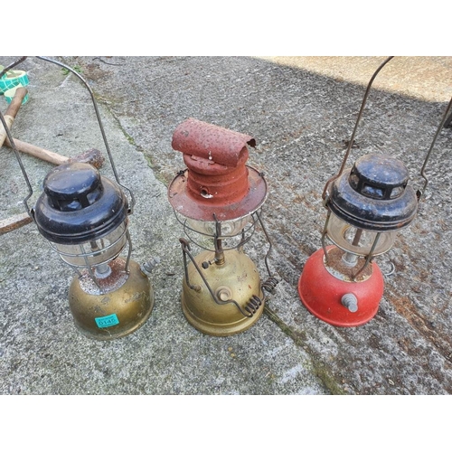 145 - Three vintage Tilley lamps.