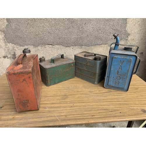 15 - Four Vintage Jerry cans. {Largest W 24 cm x H 17 cm x D 10 cm}