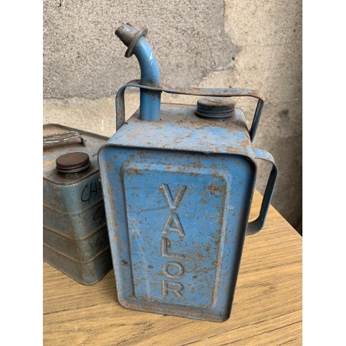 15 - Four Vintage Jerry cans. {Largest W 24 cm x H 17 cm x D 10 cm}