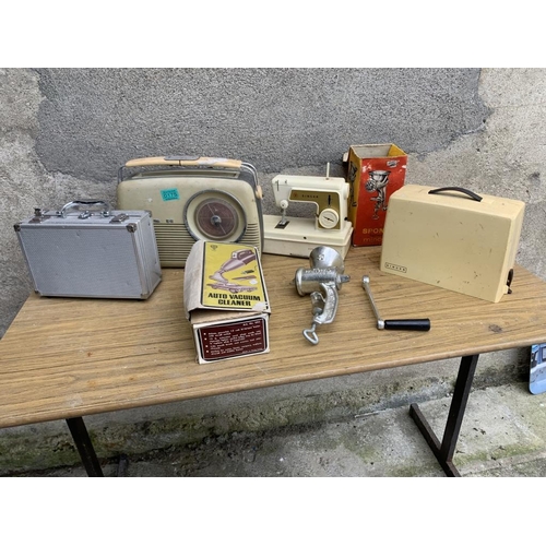 175 - Collection of vintage items including sewing, car vacuum and mincer.