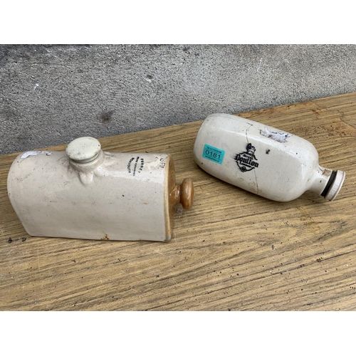 181 - Two earthenware water bottles. {W 26 cm x H 16 cm}