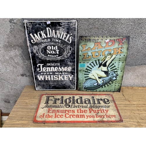 218 - Collection of advertising signs including three Tin plate signs, Jack Daniels. {Largest W 32 cm x H ... 