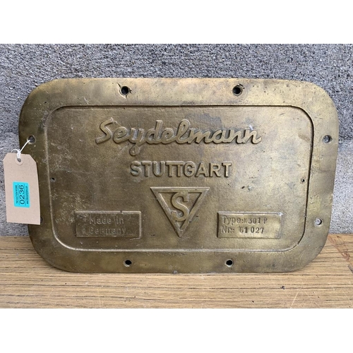 236 - Brass 'Seydelmann Stuttgart' wall plaque. {W 47 cm x H 30 cm}