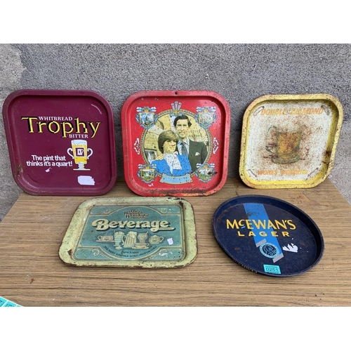 251 - Collection of five tin plate serving trays, McEwan and Royal interest.