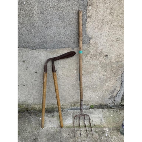 265 - Vintage shears and hay rake. {H 130 cm}