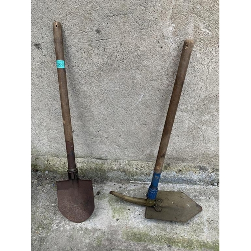 266 - Two military spades and shovel. {H 76 cm}